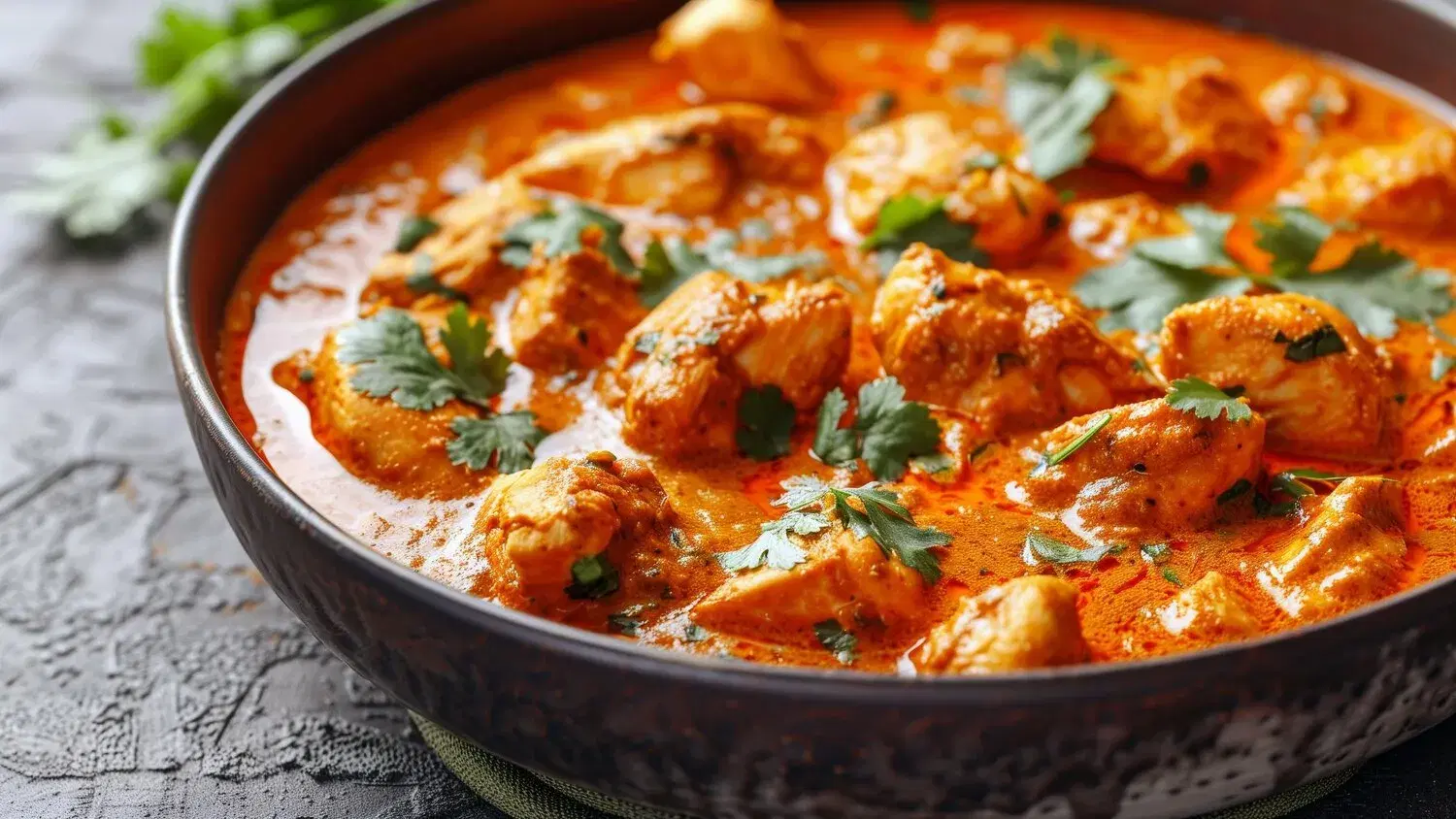 Butter Chicken Butter Chicken https://4kym48m6w0dj35od.public.blob.vercel-storage.com/dishes/internal/butter-chicken-1759419522404.webp